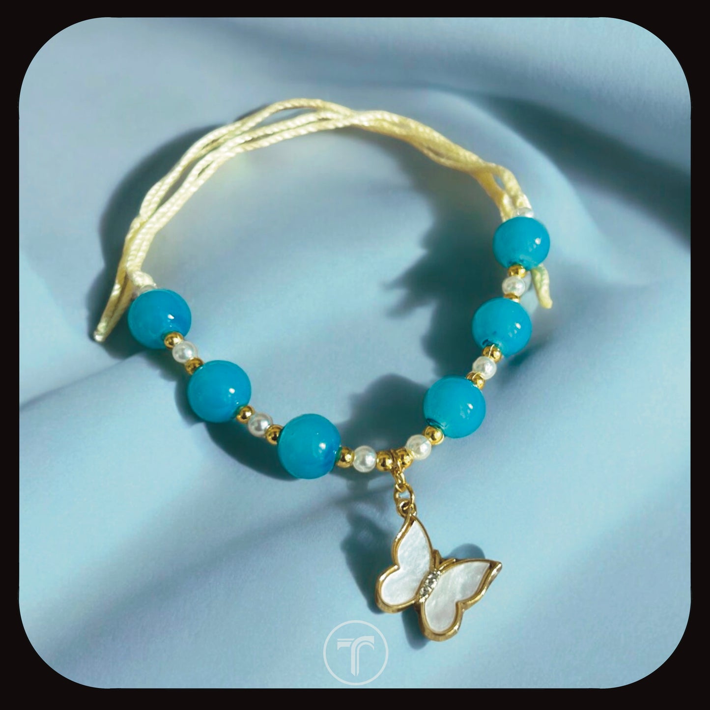 The Turquoise Butterfly Charm Rakhi For Him