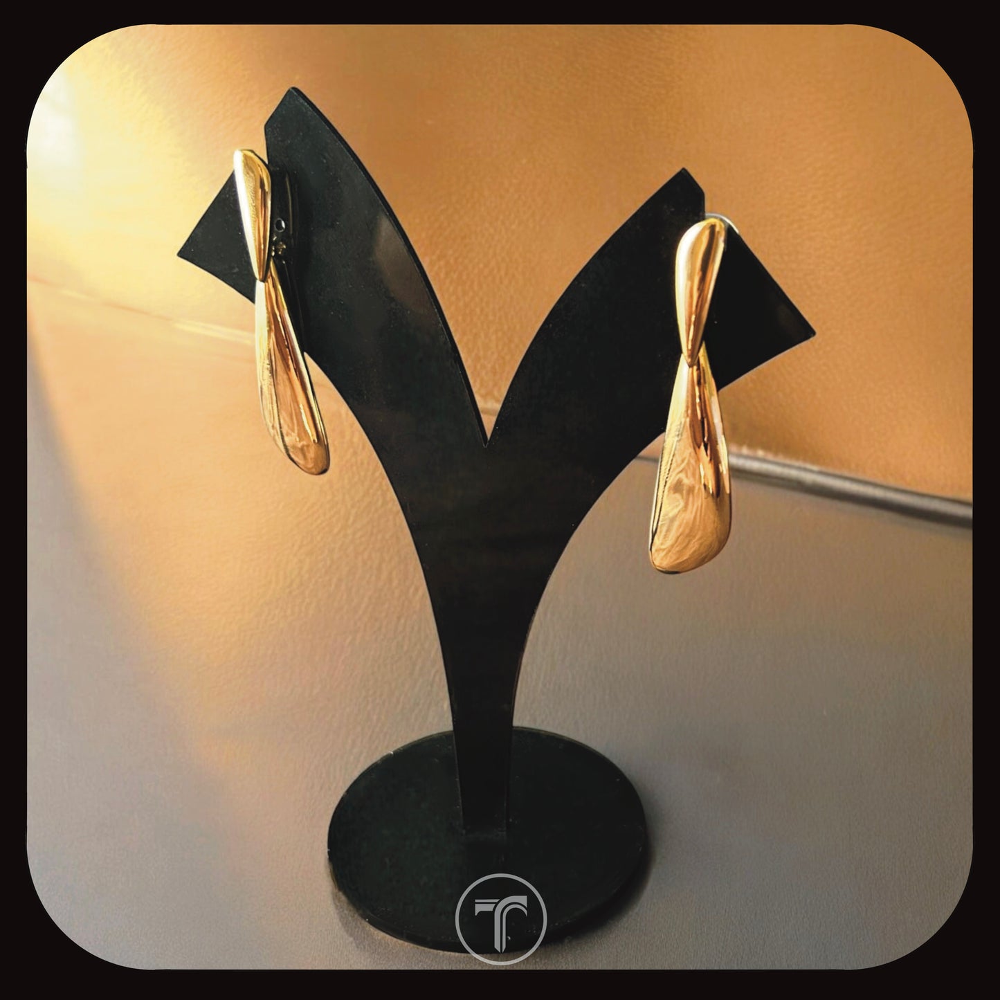 The Aurin Cascade Dangler Earrings