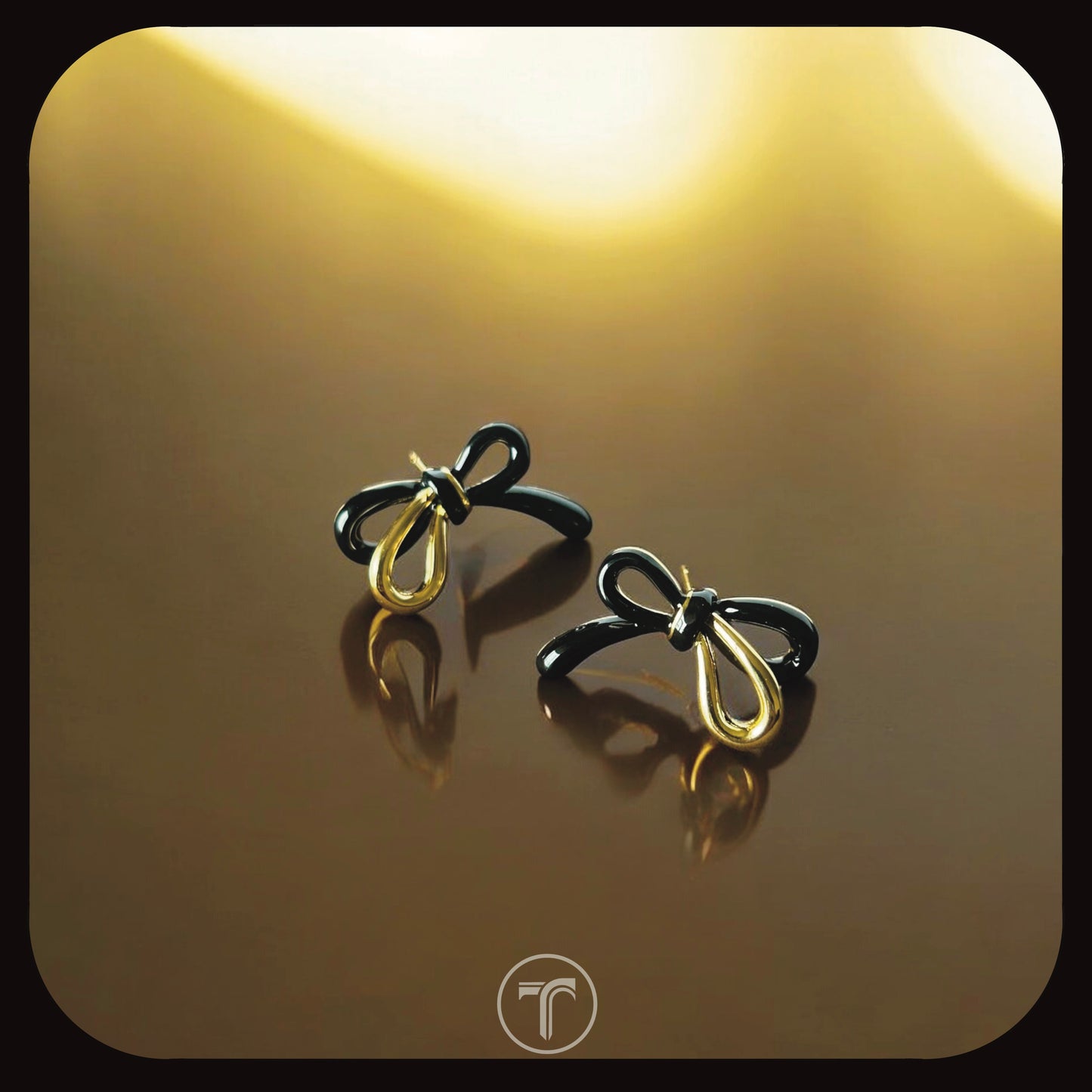 The Black Enamel Bow Ear Studs