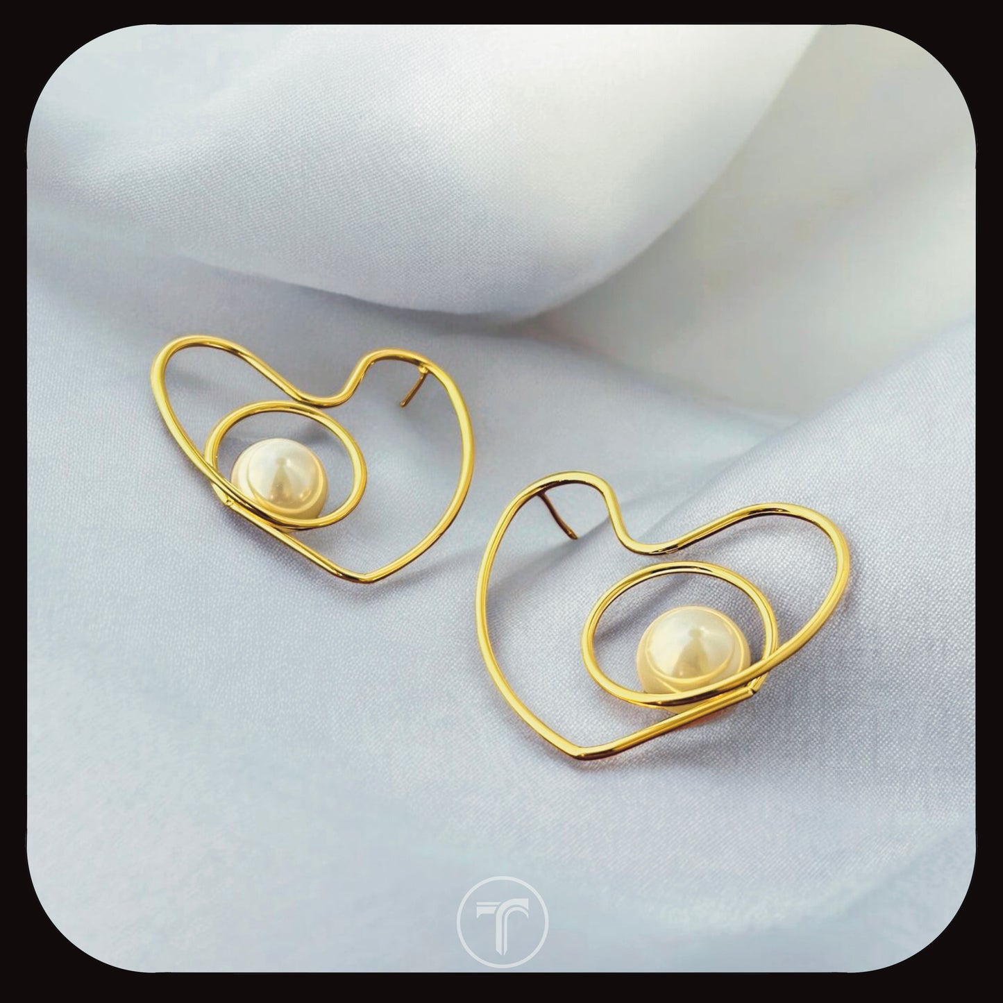The Amoret Pearl Stud Earrings