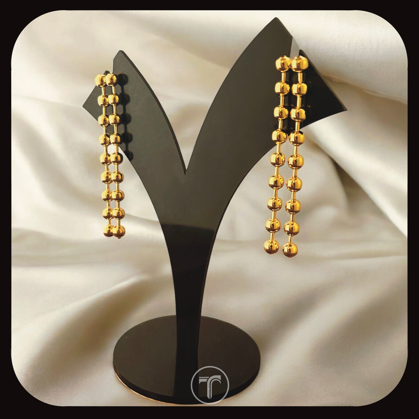 The Mycera Dangler Earrings