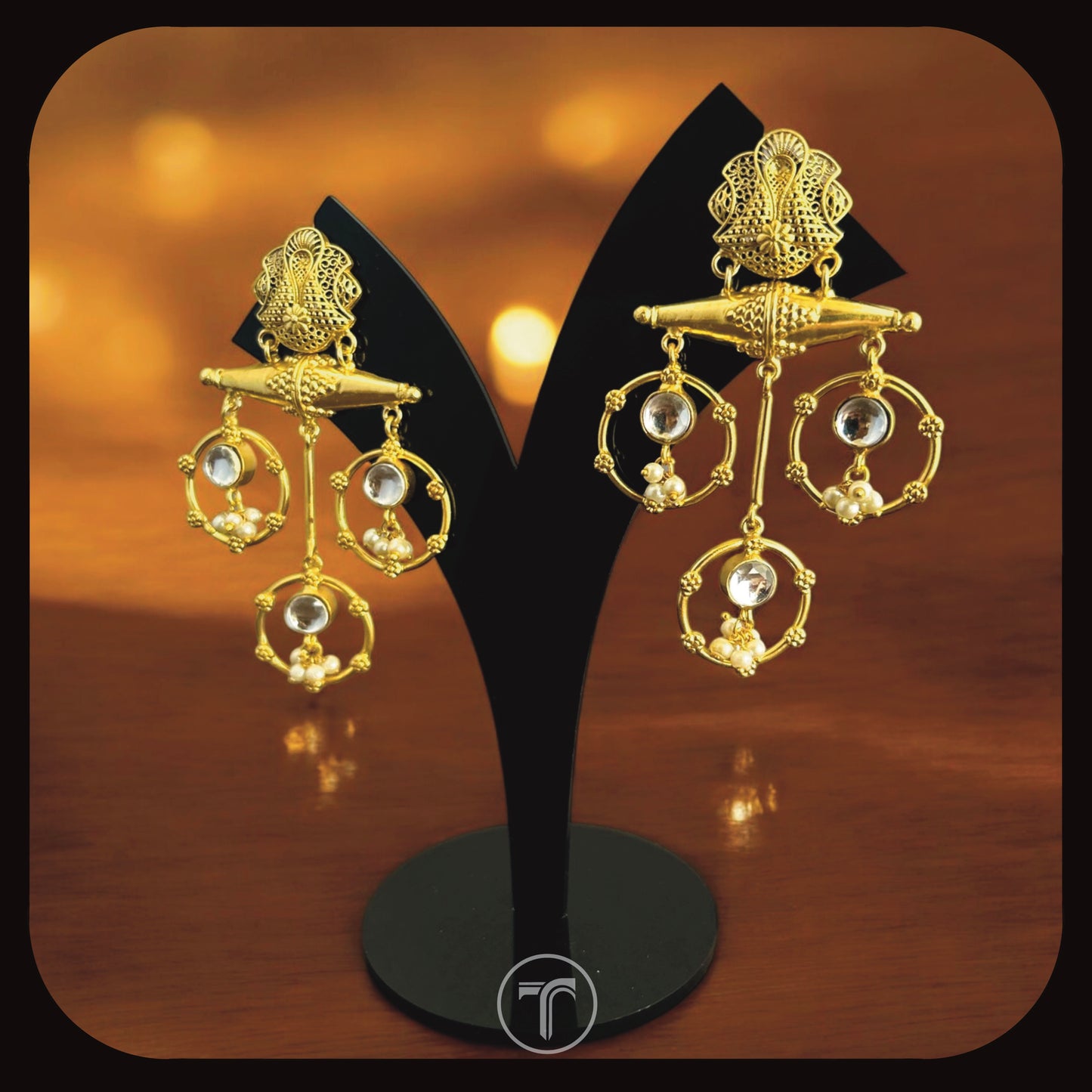 The Trikashi Dangler Earrings