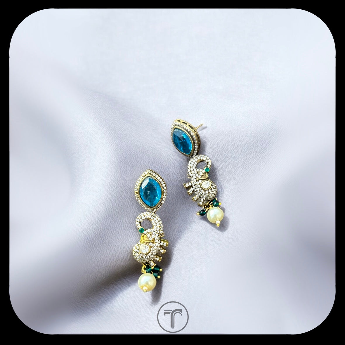 The Elephanio Dangler Earrings
