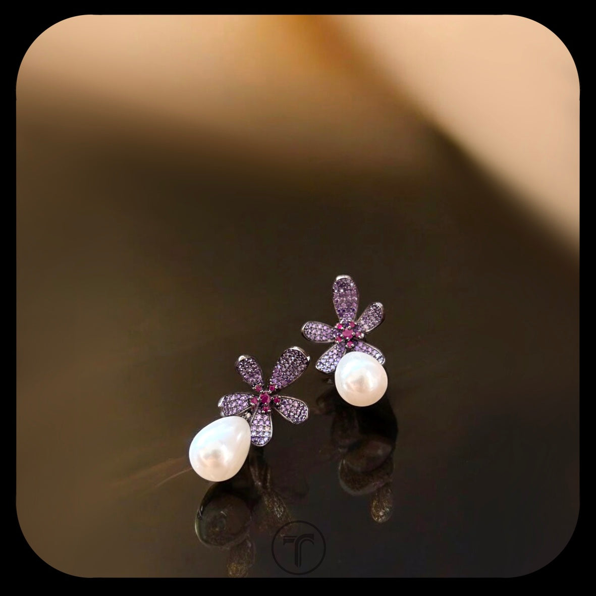 The Siyeni Dangler Earrings
