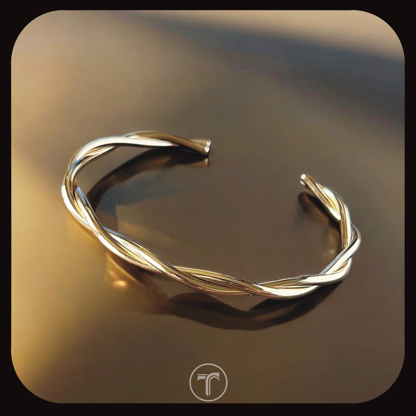 The Twisted Oval Bangle