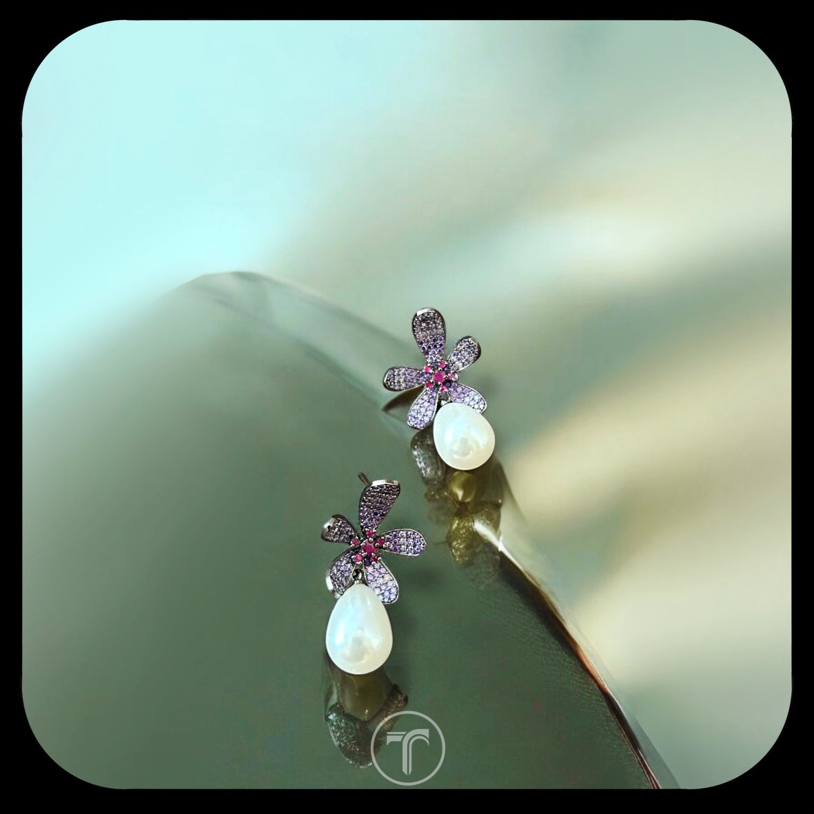 The Siyeni Dangler Earrings